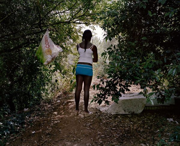 © Paolo Patrizi - Dona, a sex worker, stands by her makeshift bed, Rome, Italy