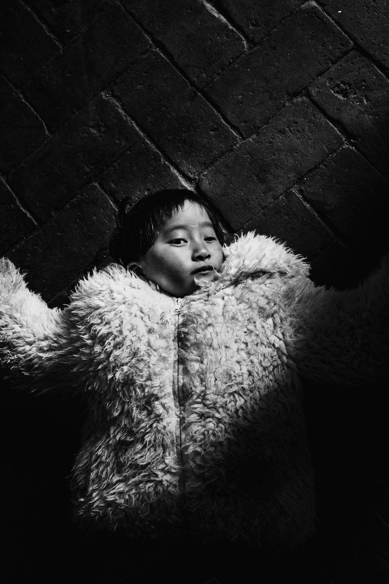 © Jin TIAN - Image from the Wild Grass --- China's Orphans photography project