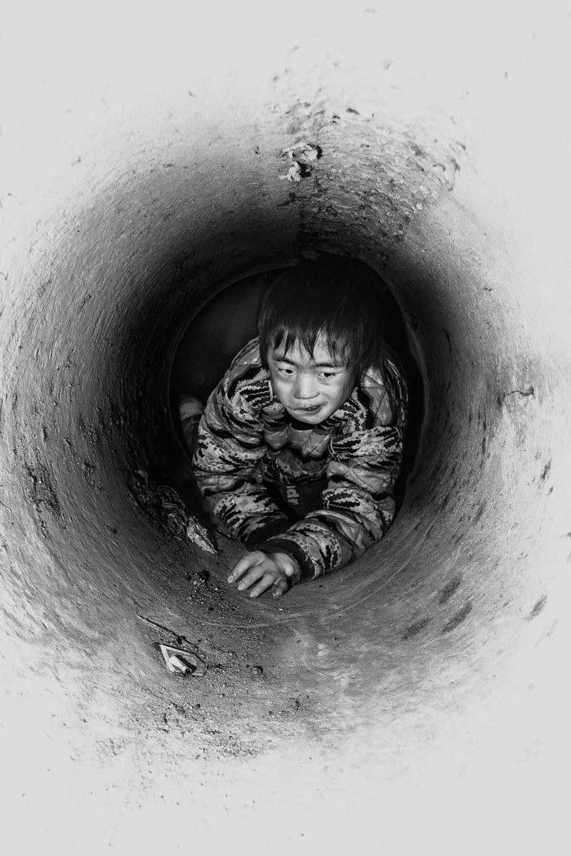 © Jin TIAN - Image from the Wild Grass --- China's Orphans photography project