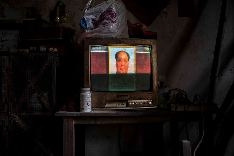 © Jin TIAN - The 70th anniversary of the National Day military parade broadcast on TV.