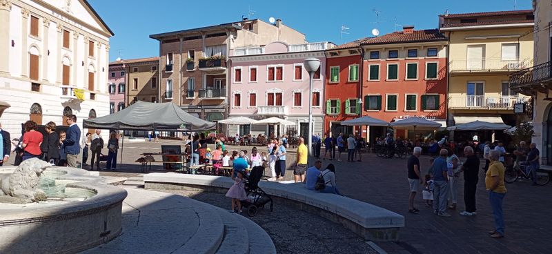 © Jürgen Joherl - Social Gathering around the church on Sunday @Bussolongo, Italy