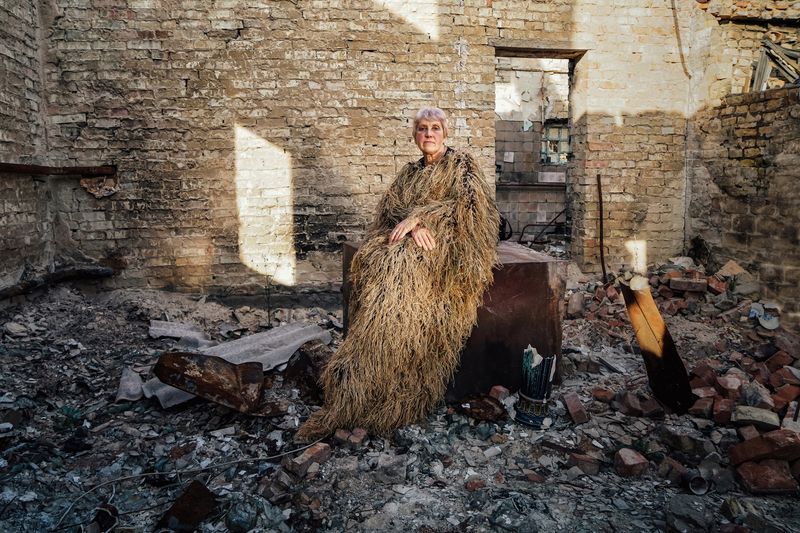 © Alena Grom - Katerina on the ruins of her home.