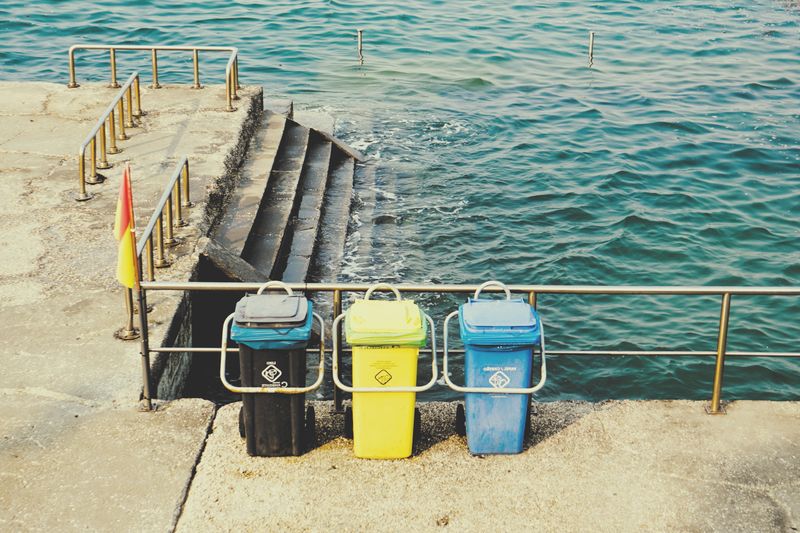 © Eduardo Rosas - Beachfront waste bins marking the edge between sand and sea
