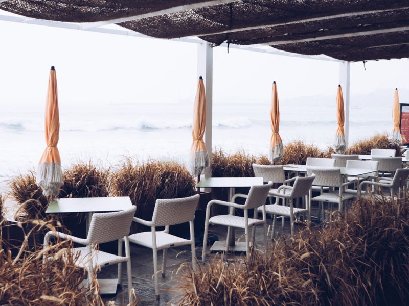 © Eduardo Rosas - A seaside café waits in stillness