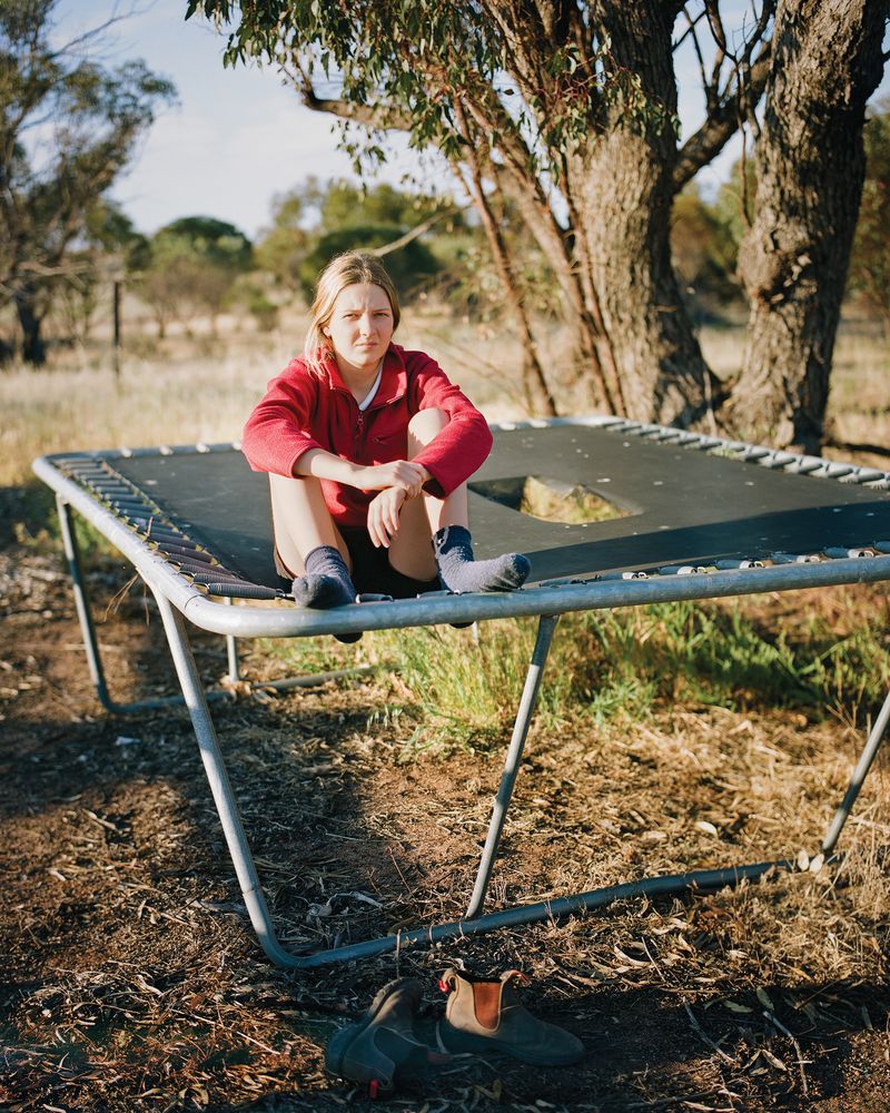 © Claudia Caporn - Phoebe, a 16 year old local, in her backyard.
