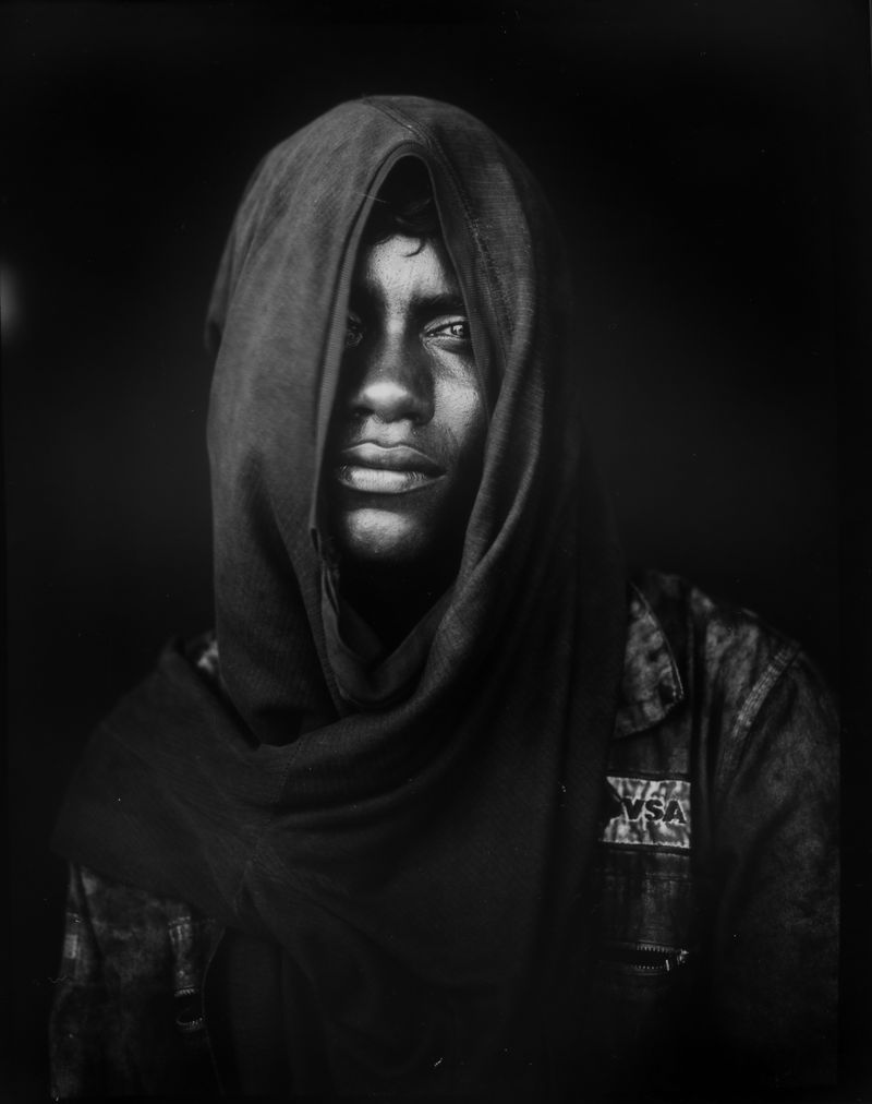 © RODRIGO ABD - Juy 10, 2019. Fisherman Milton Pena poses for the picture after a journey fishing crabs on Lake Maracaibo