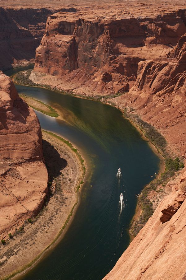 © Tanya Houghton - Boaters on the river at Horseshoe bend, Page, Arizona.