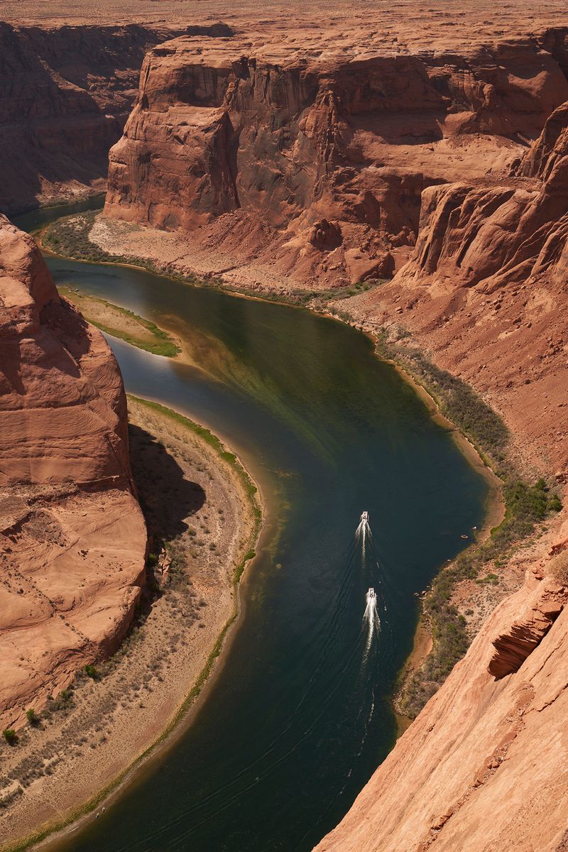© Tanya Houghton - Boaters on the river at Horseshoe bend, Page, Arizona.