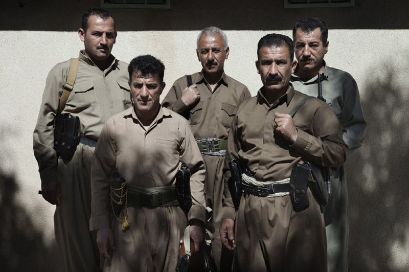 © Antonio Zambardino - Five Peshmerga pose for a group portrait in the military Headquarter of Halabja.