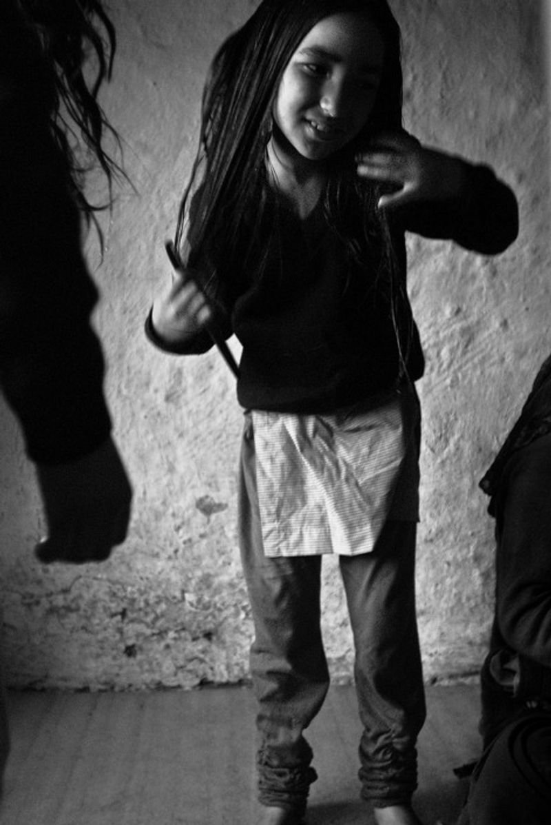 © Harikrishna Katragadda - Eight year old Neha prepares to go to school.