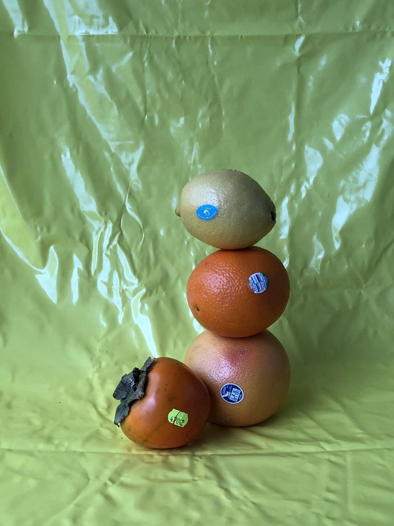 © Julianna Balla - A still life on my balcony with fruit. It is interesting to me that we brand our food; a strange concept