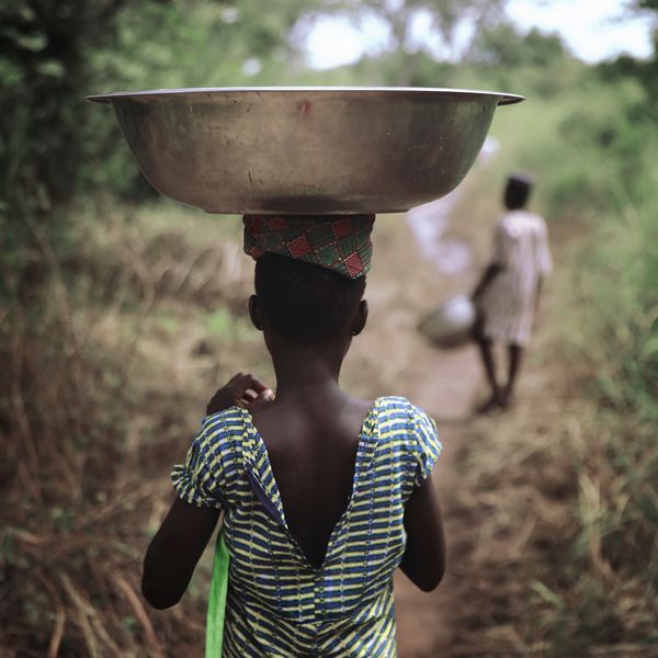 © Natalia Kovachevski - "Precious Quest" - A child who fetches water daily for his family, in a remote village in central Togo.