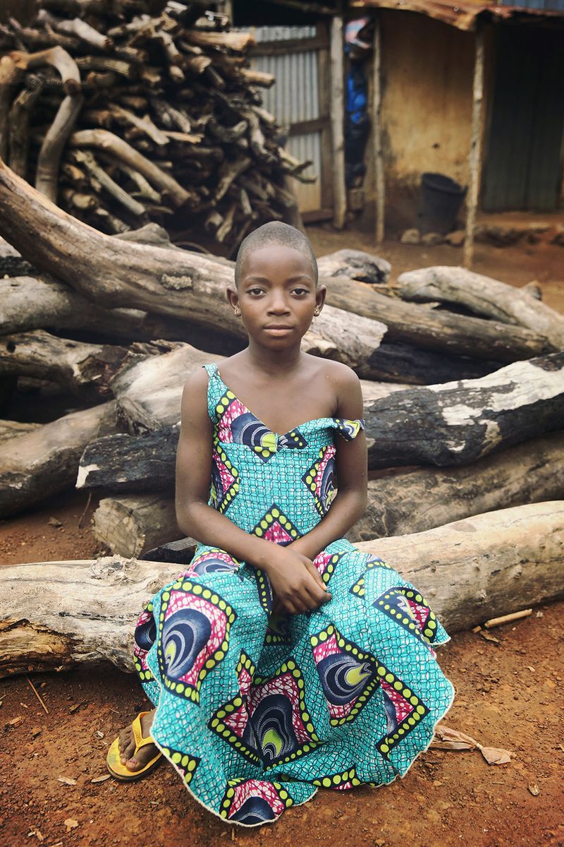 © Natalia Kovachevski - "The Blue Dress" - Portrait of a Togolese girl, during a traditional harvest festival in Sotouboua