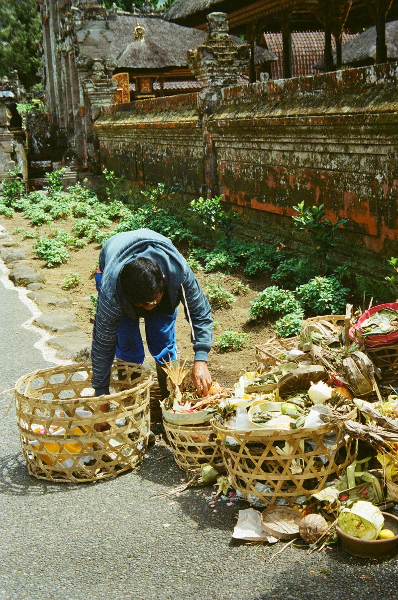 © Flavia Jessica - Sorting out trash after Kuningan day in Bali.