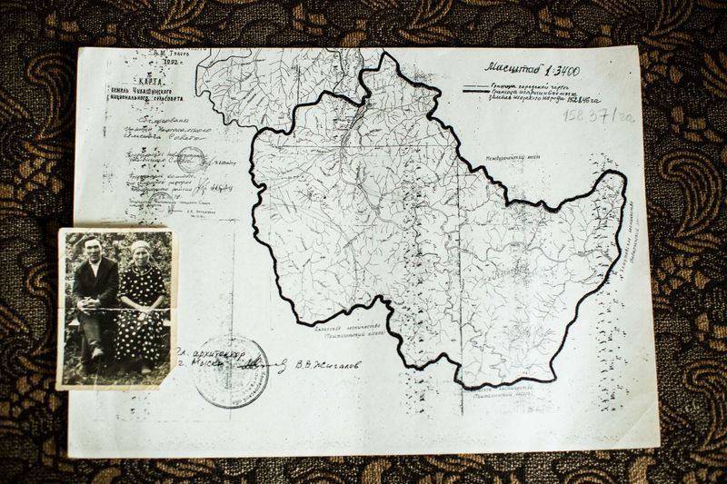 © Sally Low - Valentina’s parents photo sits alongside an old map of the area surrounding Chuvashka.