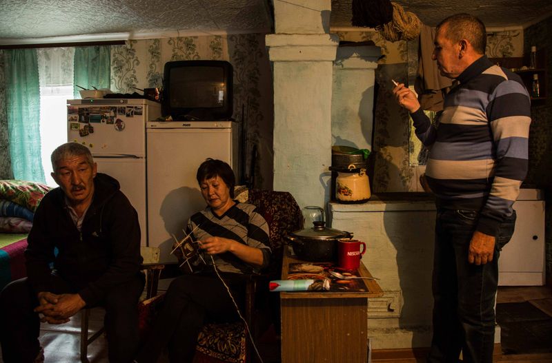 © Sally Low - Sasha and his wife in their home.