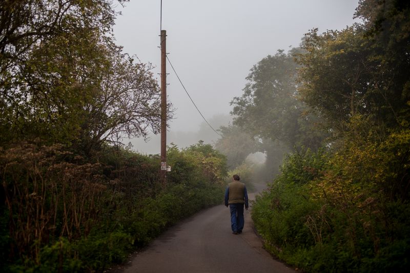 © Sally Low - Ron walks down Dews lane