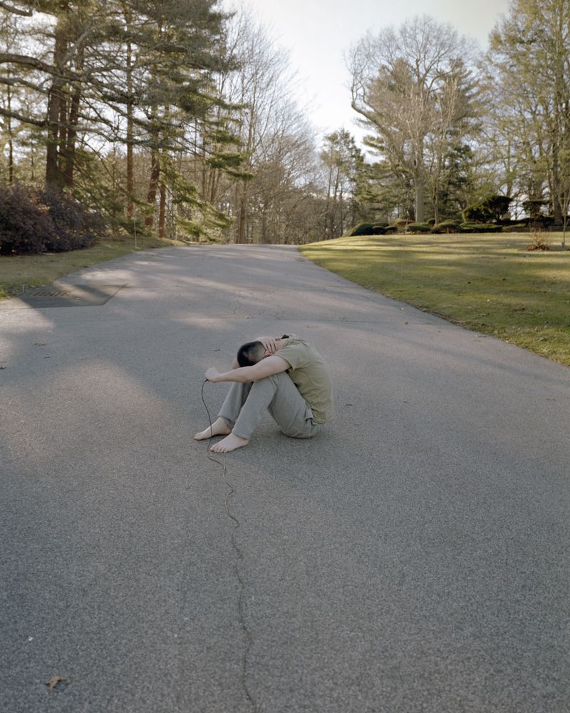 © Jialong Yang - Untitled (sitting in the middle of a road)