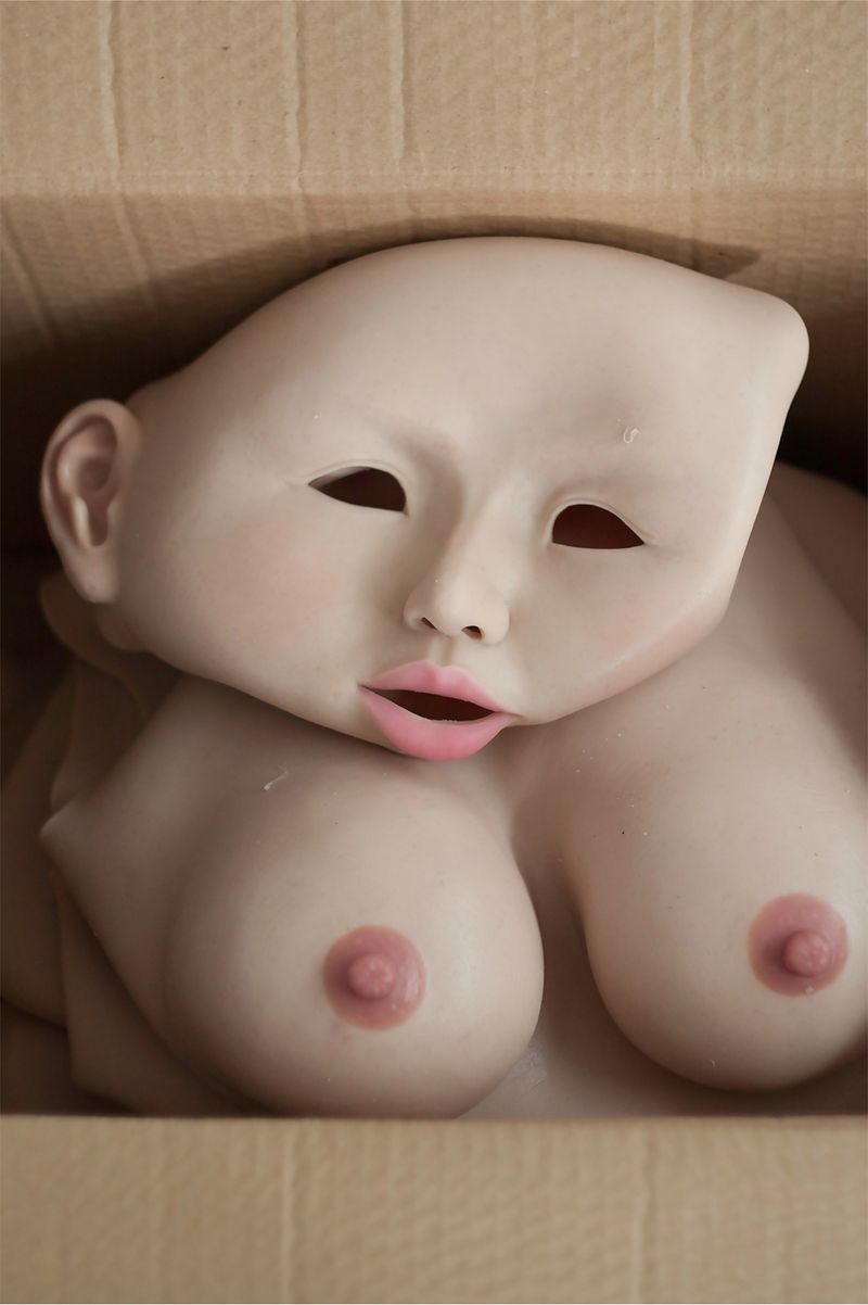 © Agata Wieczorek - Female Mask Second skins' factory Xuzhou, China, 2018 digital photography