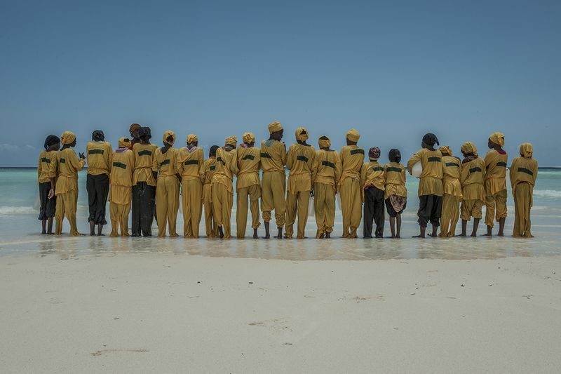 © Anna Boyiazis - Students line up on shore after learning to swim and perform rescues in Muyuni, Zanzibar.
