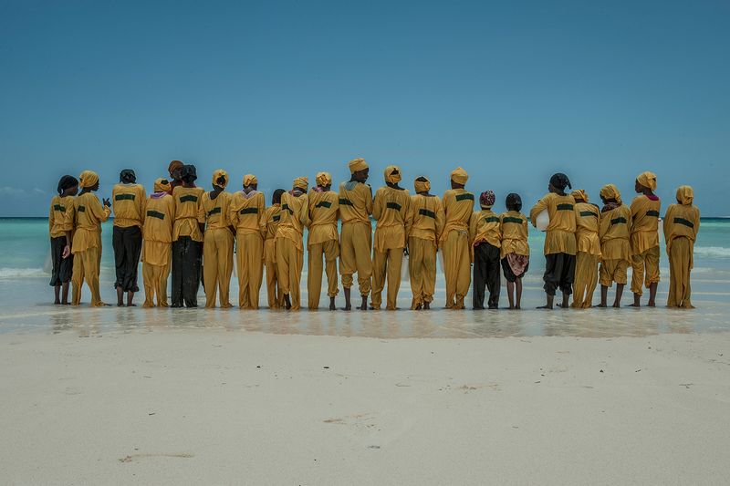 © Anna Boyiazis - Students line up on shore after learning to swim and perform rescues in Muyuni, Zanzibar.