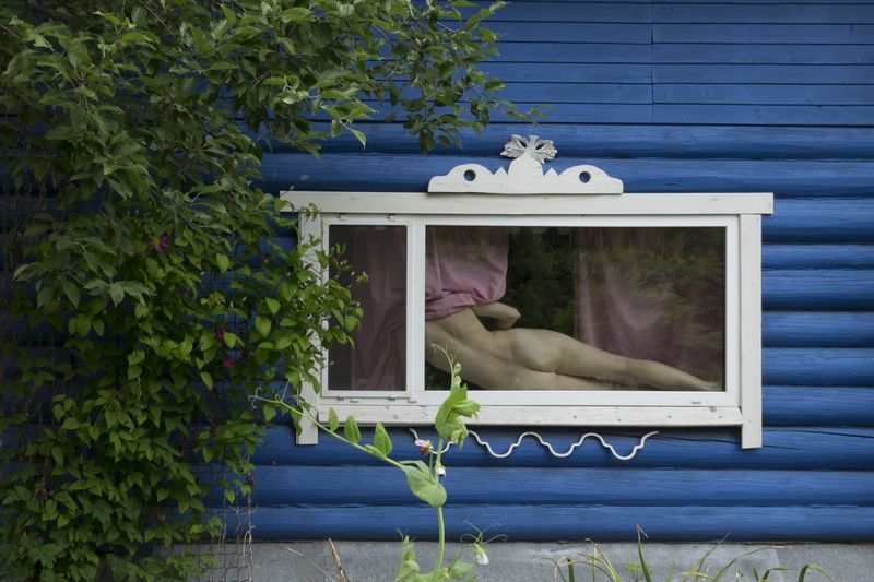 © Elena Kholkina - Self-portrait in a wooden hut