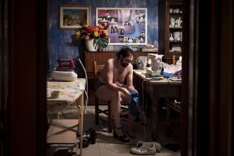 © Alice Pastorelli - Francesco while sews a costume for a show.