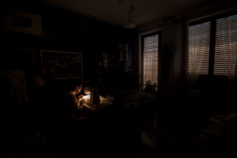 © Alice Pastorelli - Francesco while sews his trousers for a show.