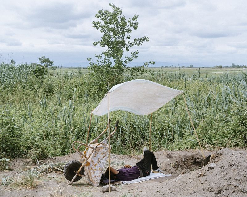 © Khashayar Javanmardi - A farmer has a siesta on his farm while the water is pumping from the lagoon to his farm. 2020.