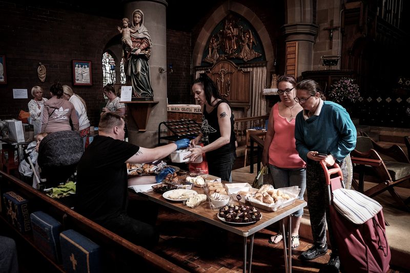 © Mary Turner - People in need come to collect free food and get a hot meal at a food bank in Hartlepool.