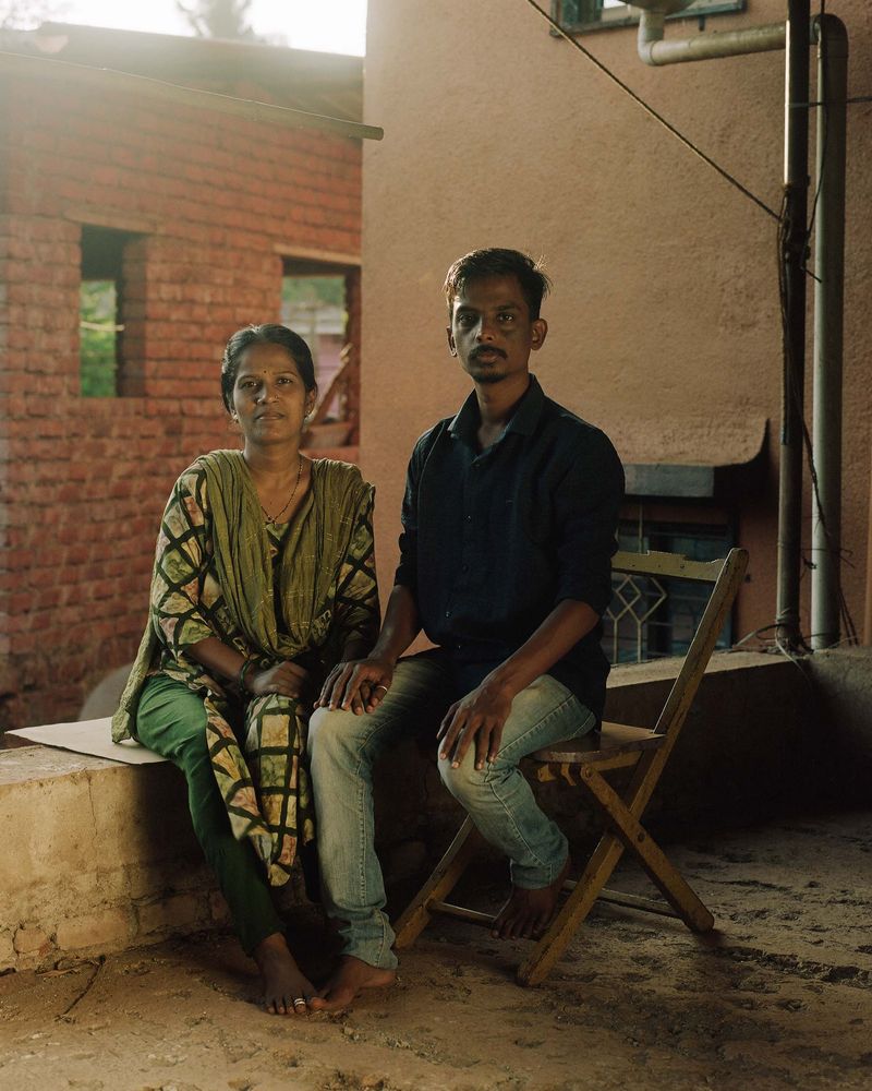 © Abhishek - A childhood friend, Anu sits beside his wife on the rooftop where we once spent our days. Dapoli, Maharashtra