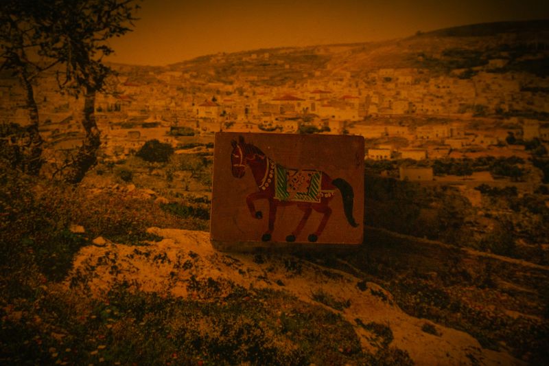 © Glorianna Ximendaz - An old photograph of the Palestinian landscape, next to a vintage hand-painted box from Gaza, a gift from my loved ones.