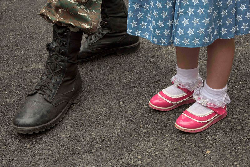© Madelaine Ekserciyan - Spongebob and Patrick painted on an ally in a street in Erevan. Spongebob is covered buy a tole.