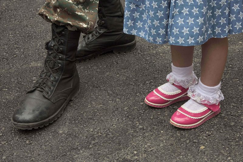 © Madelaine Ekserciyan - Spongebob and Patrick painted on an ally in a street in Erevan. Spongebob is covered buy a tole.