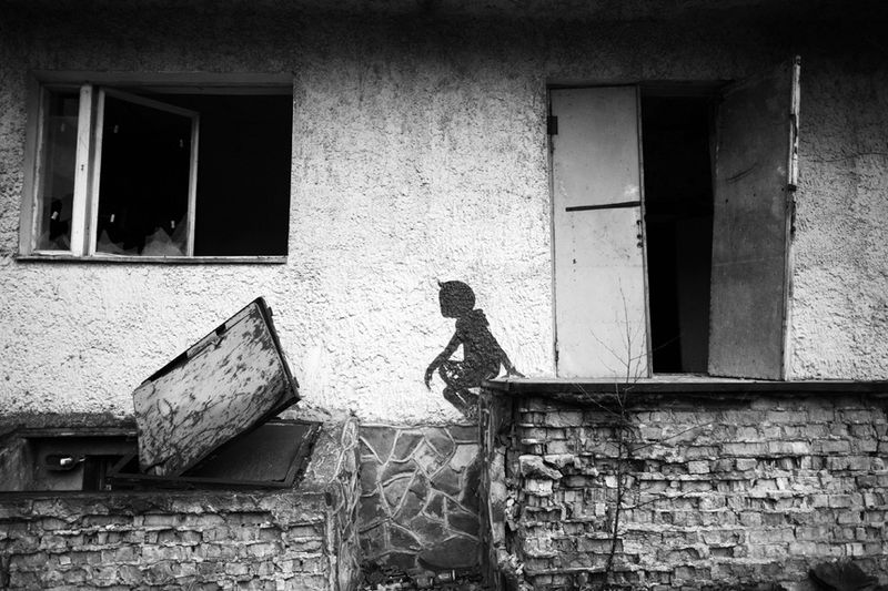 © Dina Oganova - Painting on the wall in the dead city Chernobil