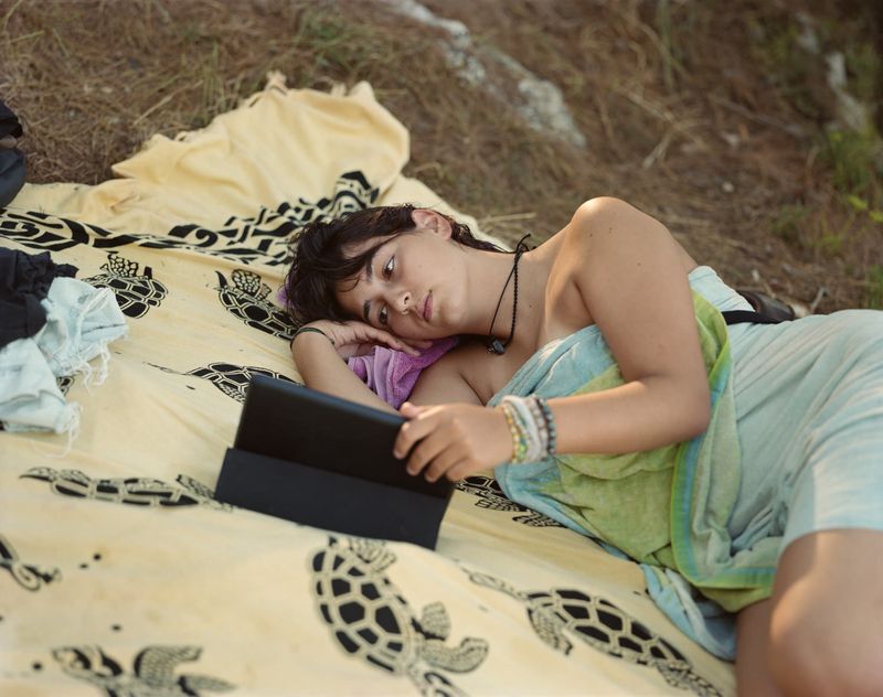 © Murray Ballard - Giulia (watching Netflix on her iPad), Porto Badisco, Salento, August 2022
