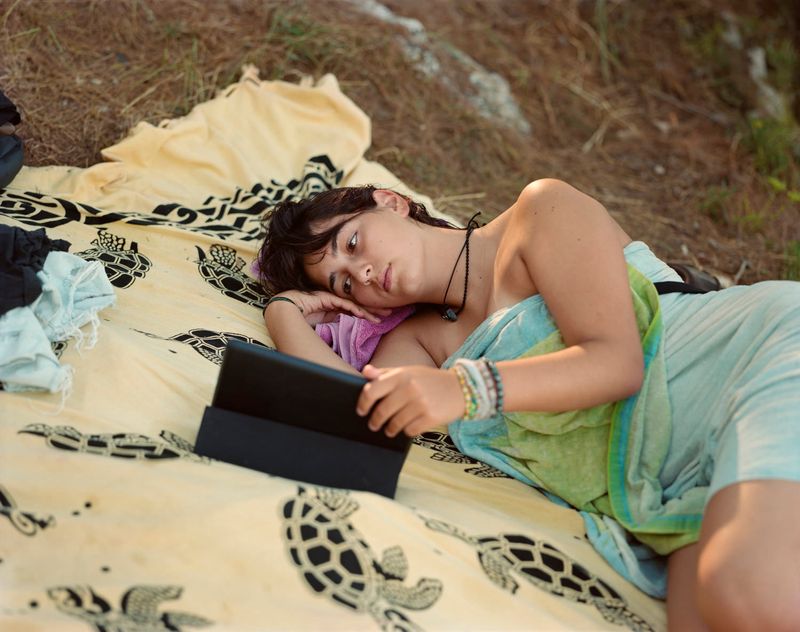 © Murray Ballard - Giulia (watching Netflix on her iPad), Porto Badisco, Salento, August 2022