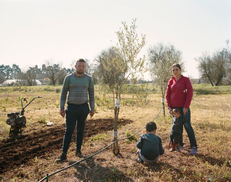 © Murray Ballard - Lonut (father), Rares, Alessandro and Cristina (mother), near Cerfignano, Salento, February 2023
