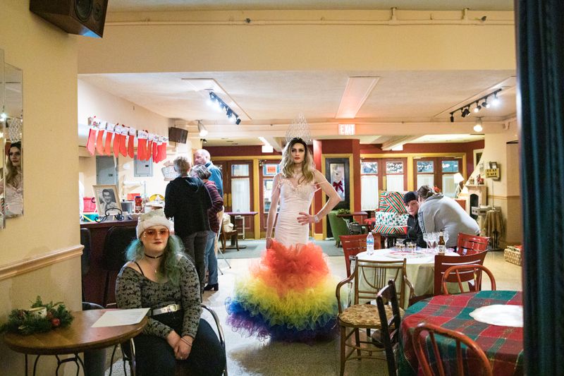 © Michael Snyder - Ember Sparxx at a drag event in a cafe in Cumberland, MD.