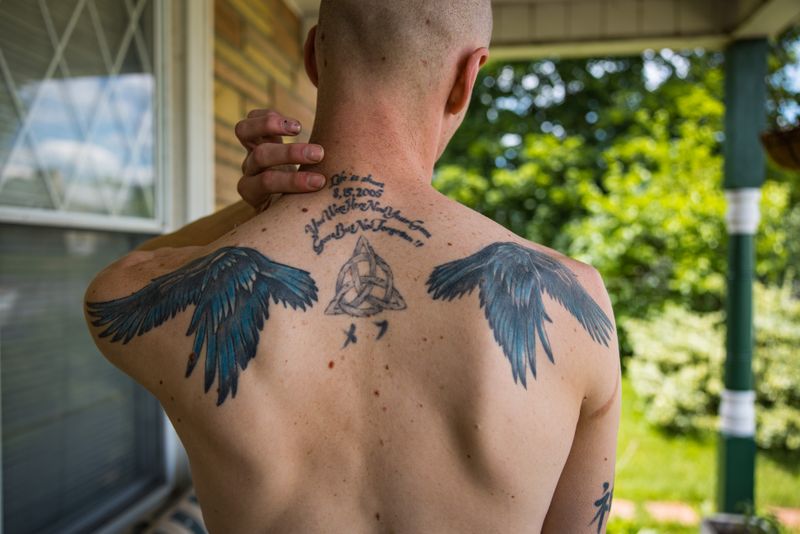 © Michael Snyder - Aradia shows off her tattoos in remembrance of lost friends.