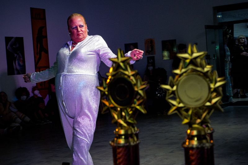 © Michael Snyder - Christian Diane, a pioneering elder in the community, preforms at a drag pageant.