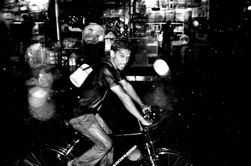 © K. M. Asad - A rainy day daily labour going home after finished work.