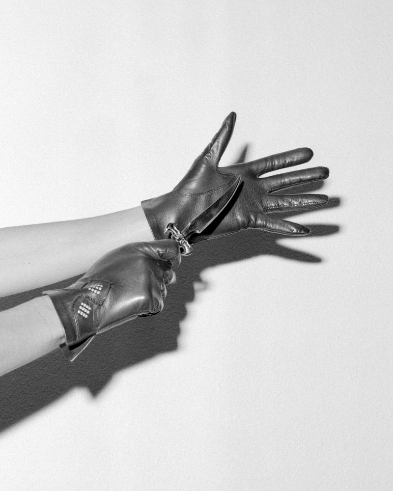 © Meg De Young - Knife & Gloves, 2026