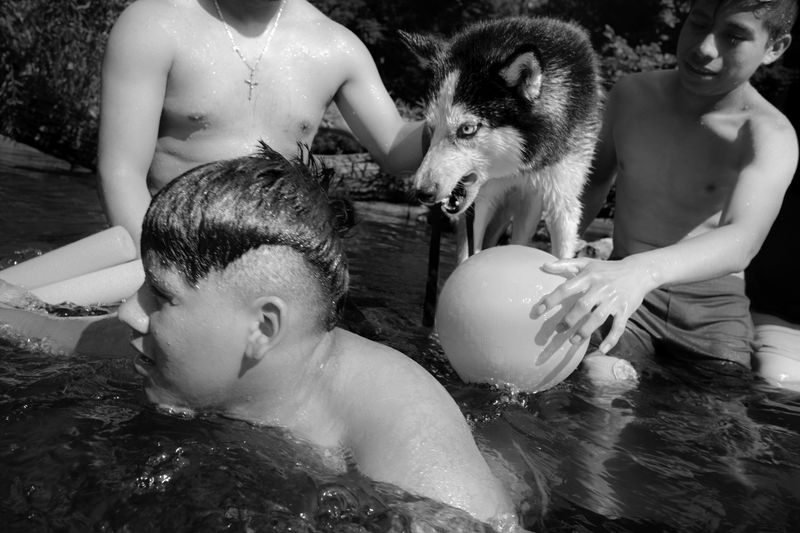 © Caleb Stein - Men & Huskie, The Watering Hole, 2018