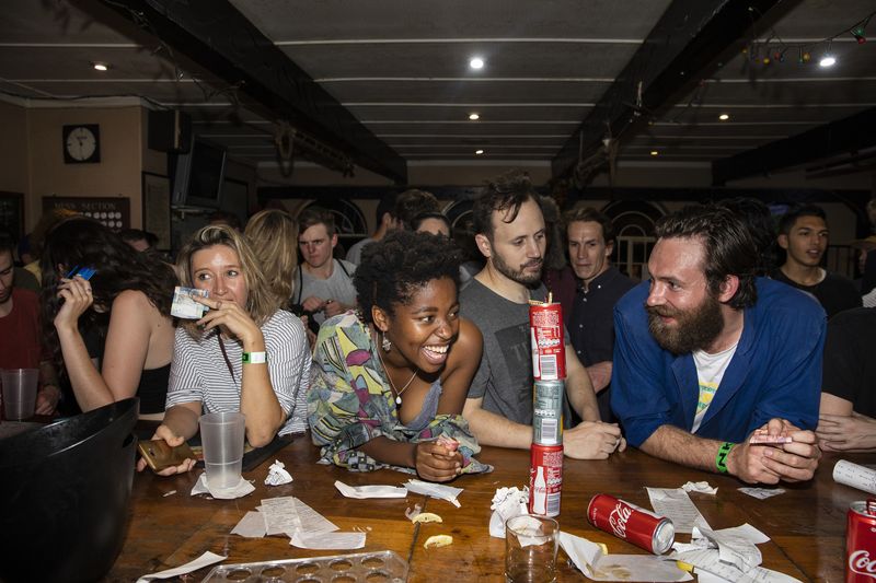 © Ilvy Njiokiktjien - People try to order drinks at a concert of Desmond and the Tutu's in a bar in Parkhust, Johannesburg, South Africa.