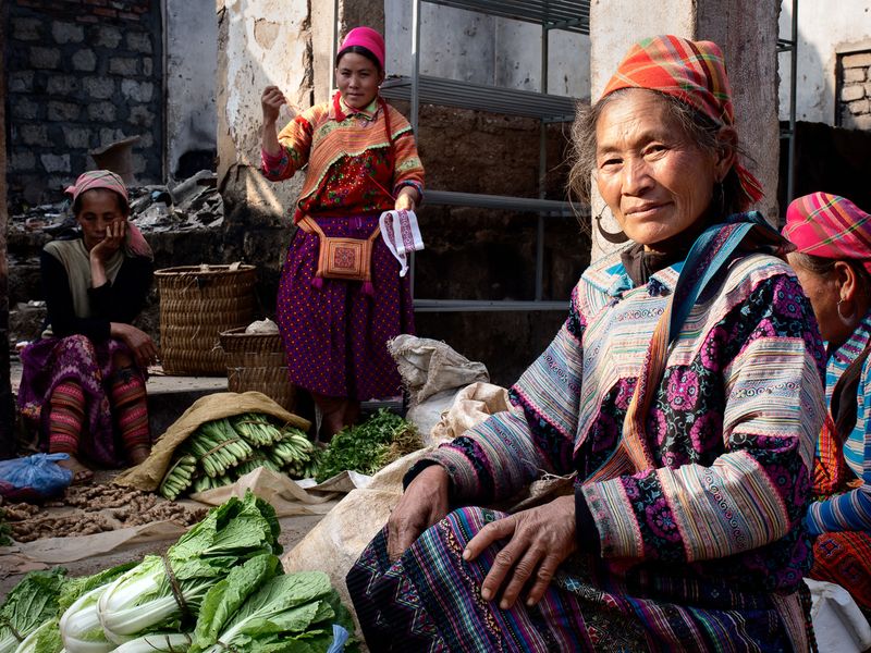 © Tony Corocher - "The local market" - Ethnic women from nearby villages at a small local market in the main town.
