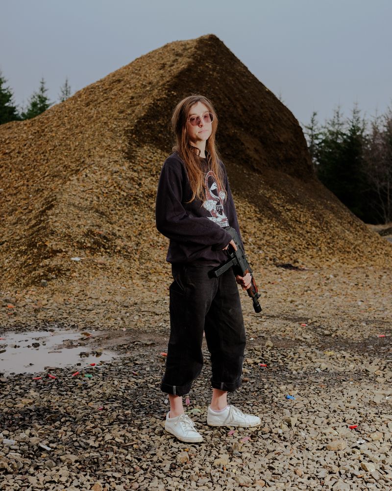 © Jordan Conway - An unnamed trans anarchist, abolitionist, and antifascist, with one of her favorite guns.