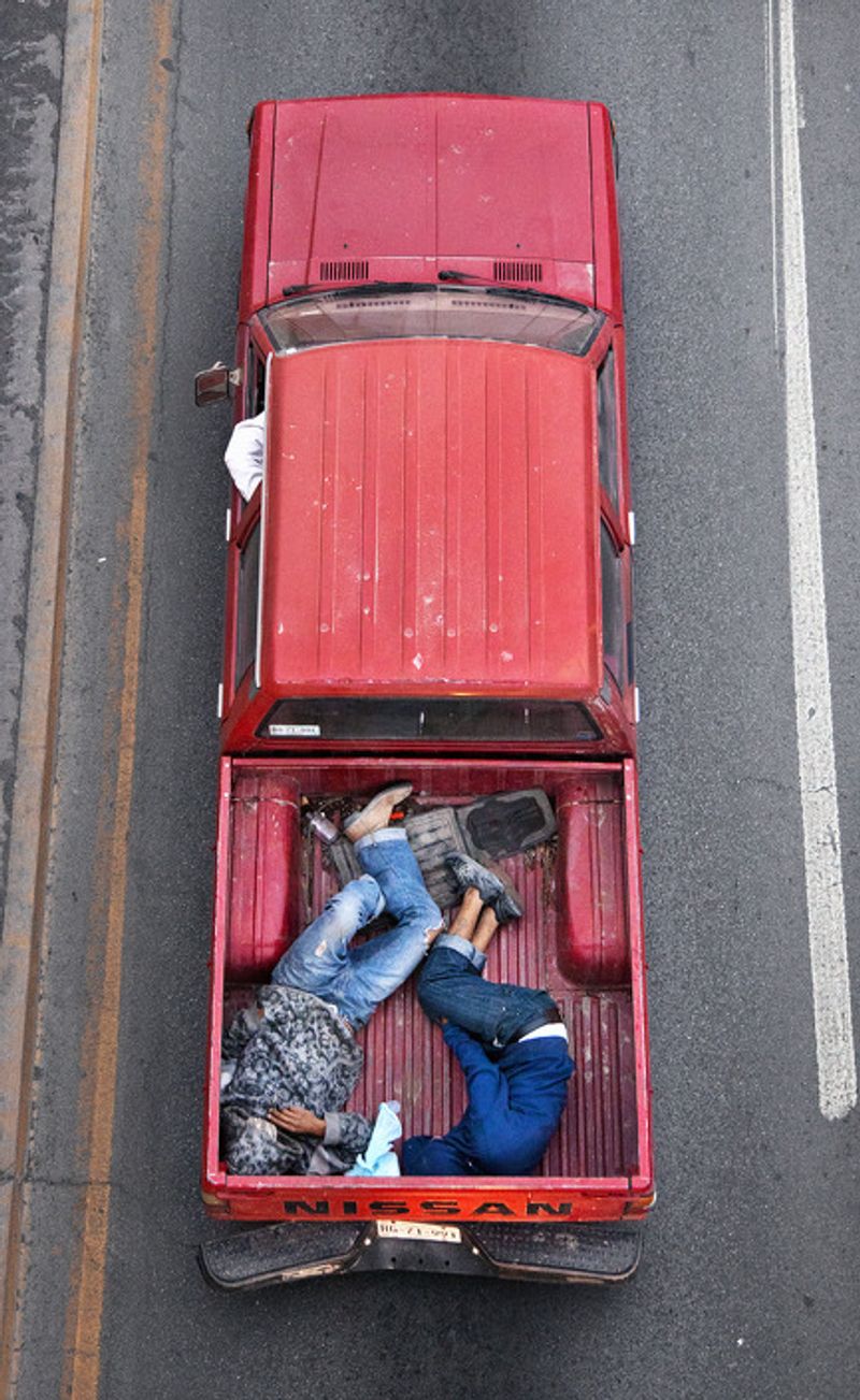 © Alejandro Cartagena - Image from the The Car Poolers photography project