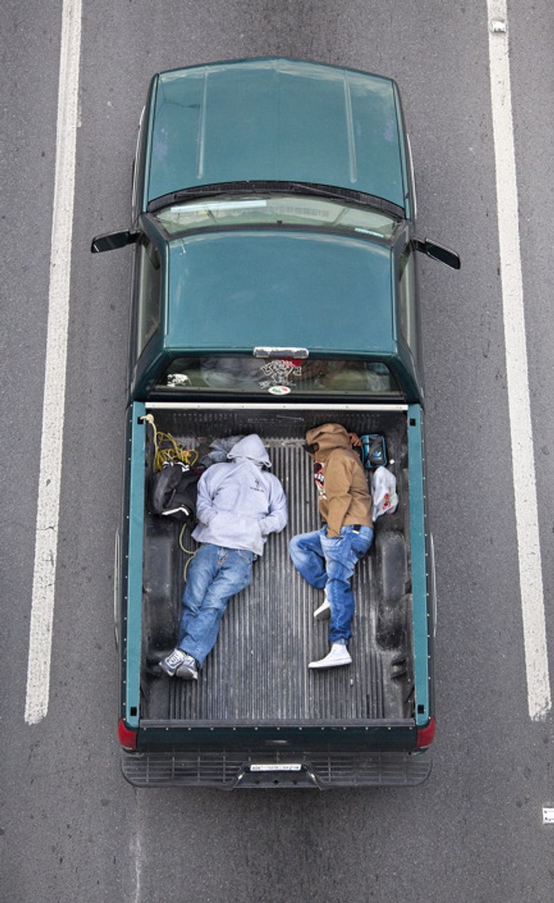 © Alejandro Cartagena - Image from the The Car Poolers photography project