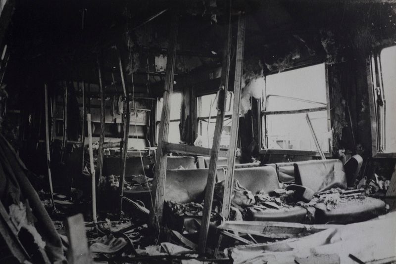 © Martino Lombezzi - FS Italian railway archives. December 24th, 1984. The destroyed train car the day after the explosion.